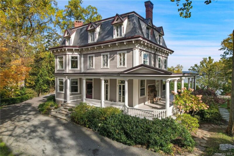 front exterior of house with wraparound porch